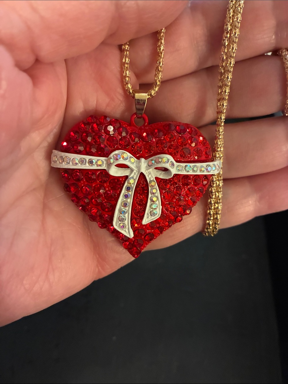 Red Crystal Heart Pendant Necklace with Bow Accent crystals on the bow.